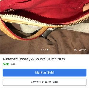 Authentic Dooney & Bourke Clutch brand new